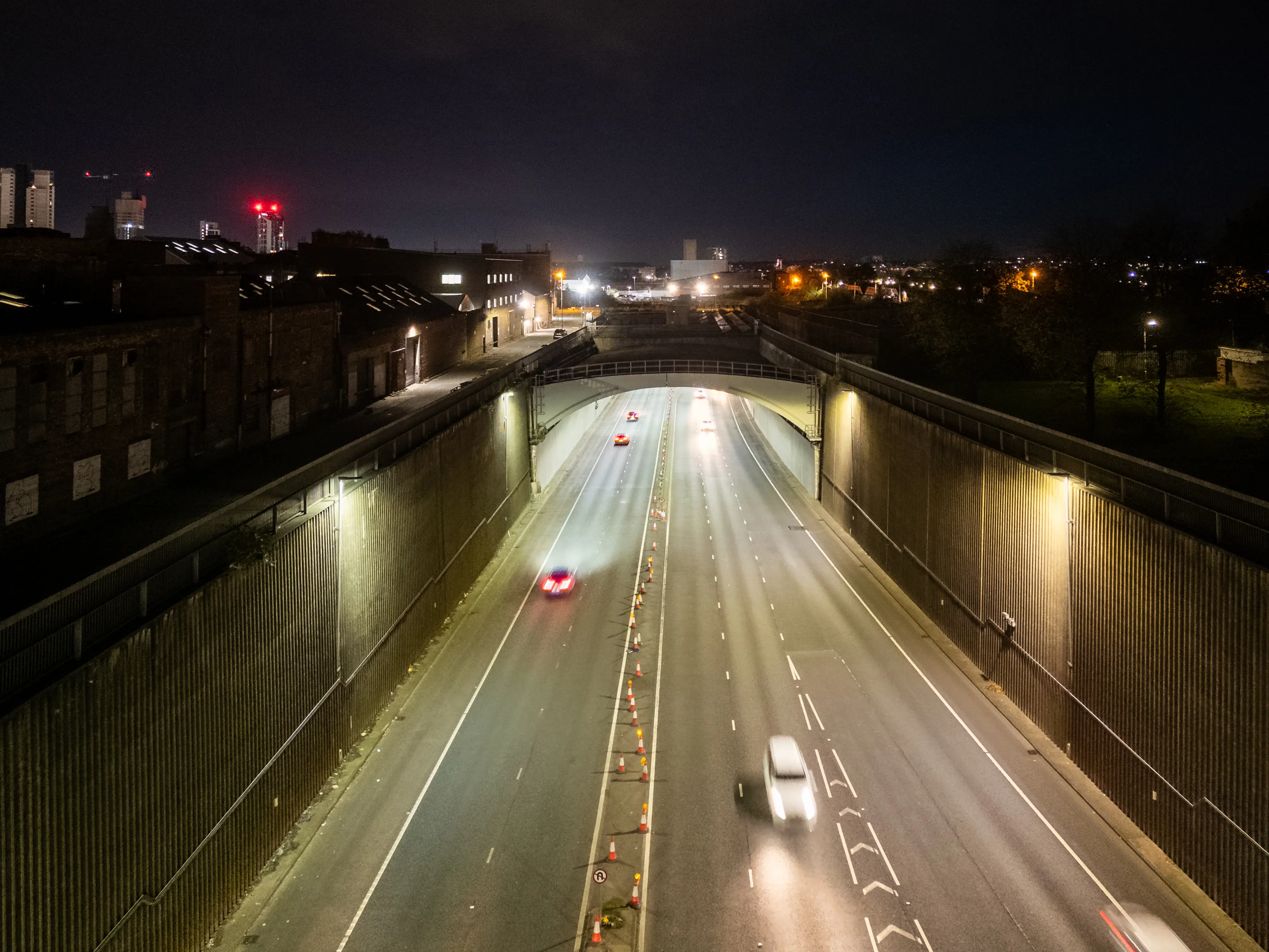 Cars driving on highway at night in Liverpool